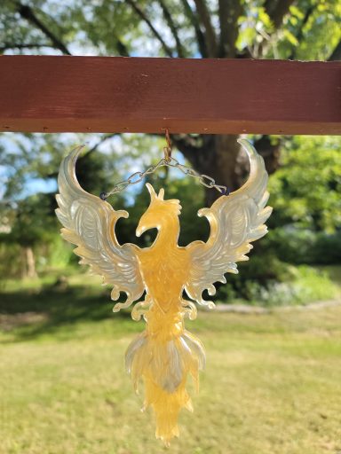 Yellow phoenix with their wings spread